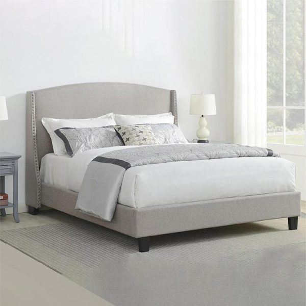 Bed with Nail head Accents and Upholstery